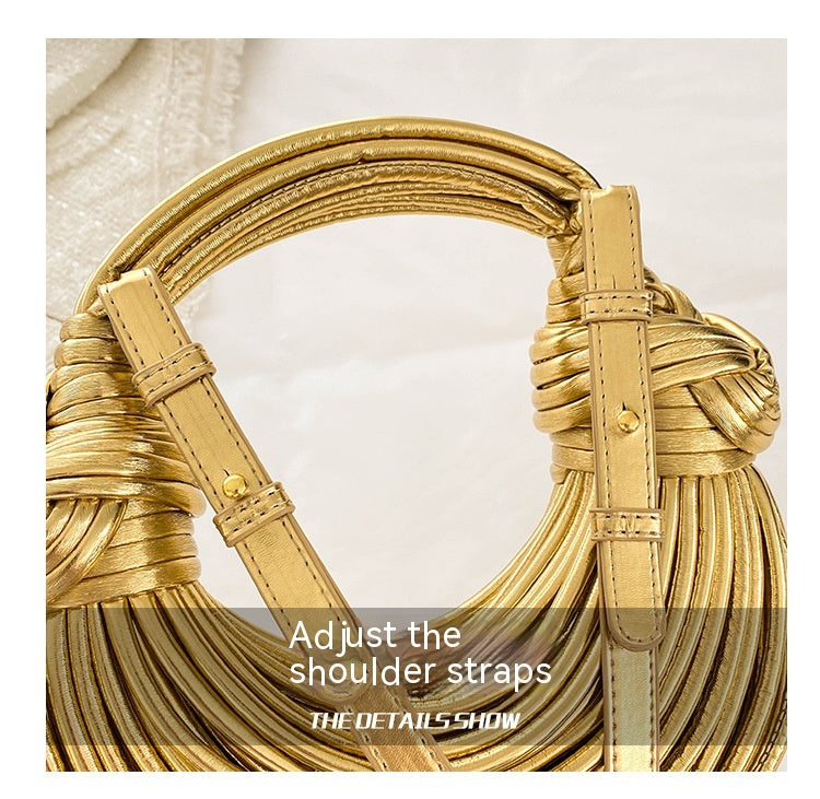 “Metal noodle fashion purse with zipper pocket interior”